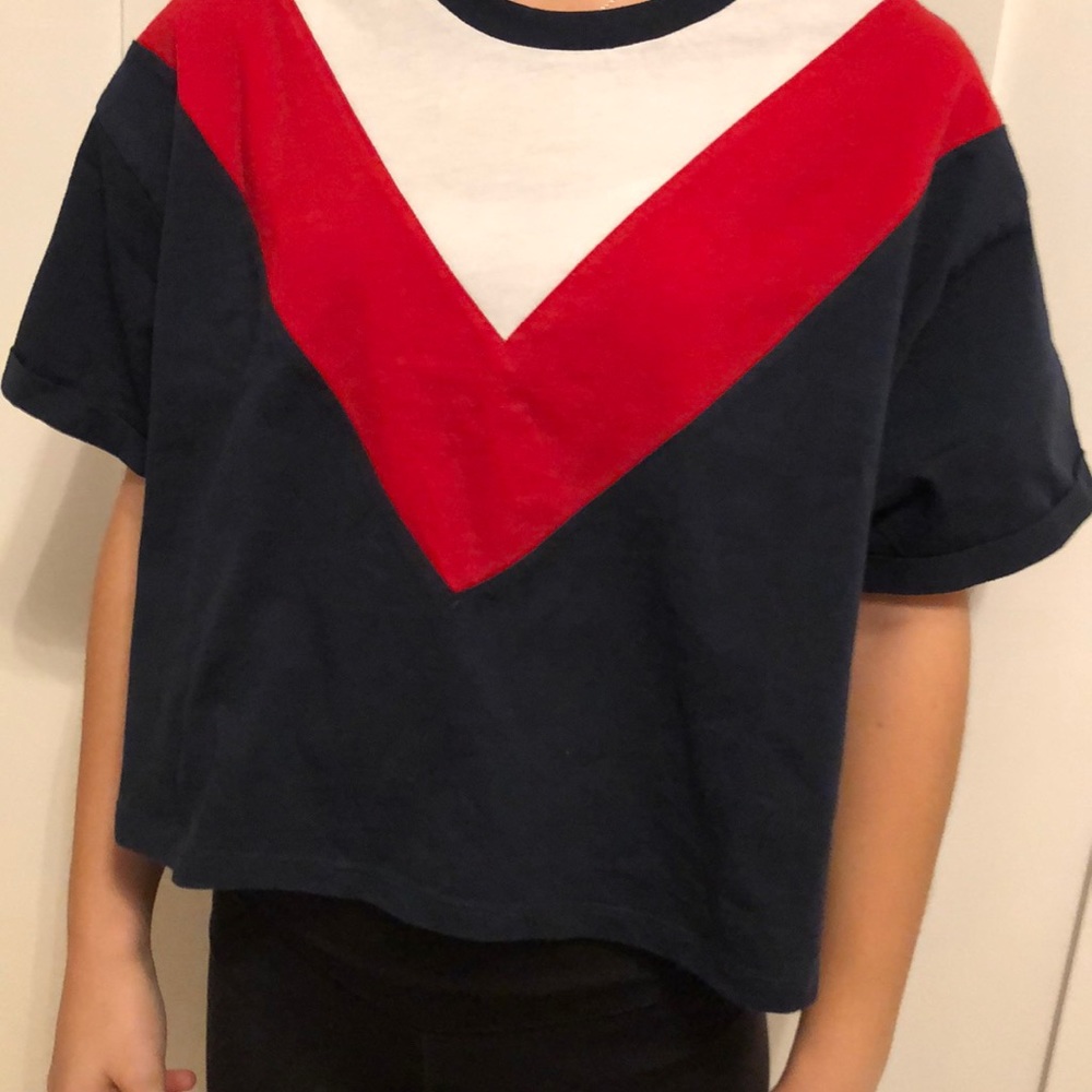 a short sleeve shirt red white and navy blue.